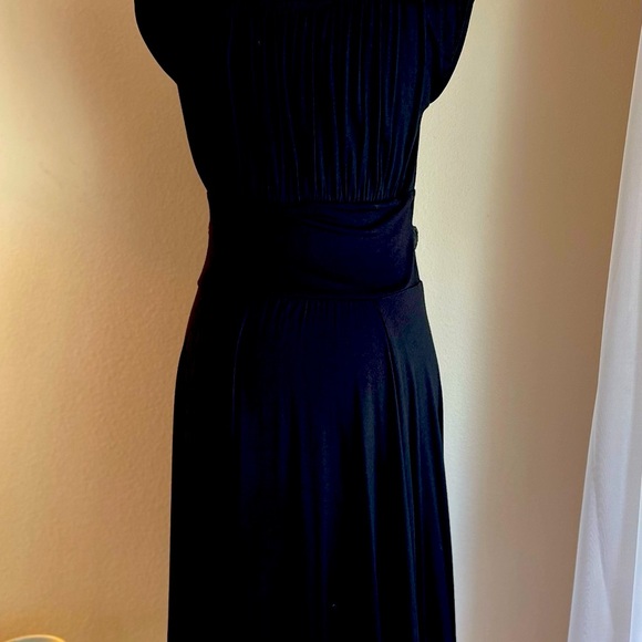 Simple black dress with built-in accents. - Picture 3 of 3